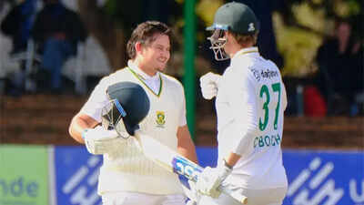 Lhuan-dre Pretorius celebrates his record-breaking innings alongside Corbin Bosch